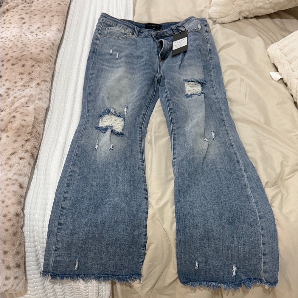 Denim Blue Flare Jeans with Distressed Details